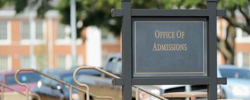 sign for the admissions office at a college