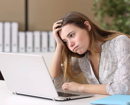 frustrated student applying to college online