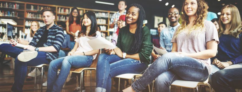 students in a fun class in the library over summer break