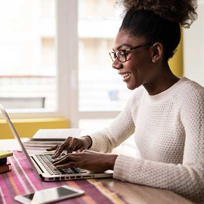 student taking online test at home