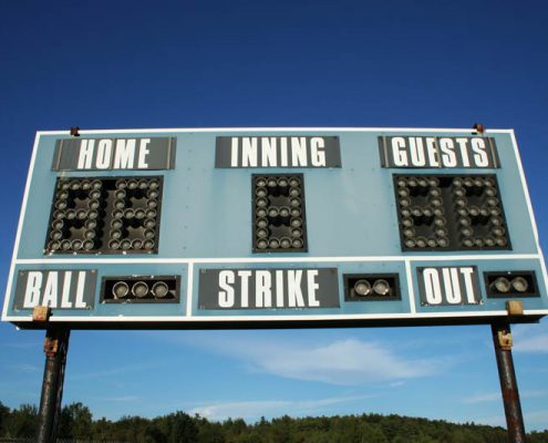 scoreboard with blue sky