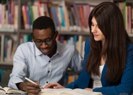tutor helping a high school student with homework